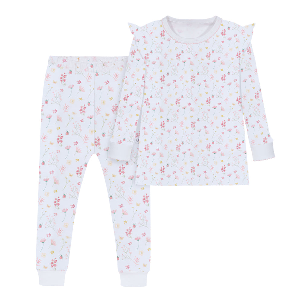 A long sleeve white pajama set for kids with a ladybug and floral print.