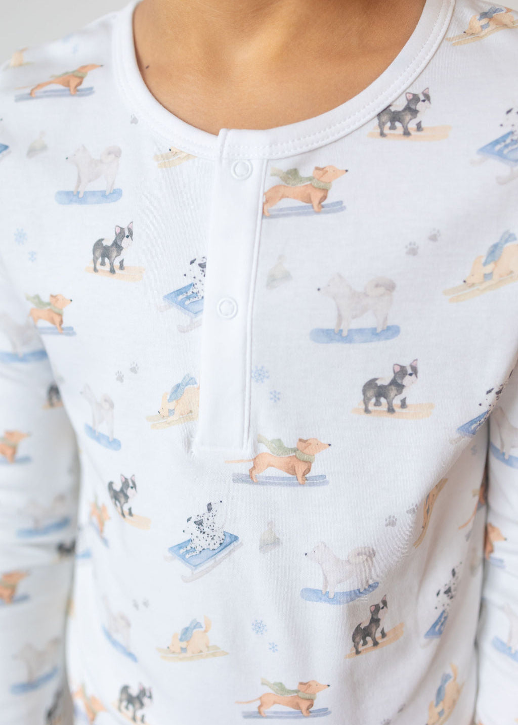Close-up of a shirt with dog pattern on a white background